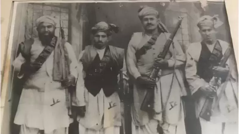 Ajab Khan Afridi (man on extreme left) and his companions.